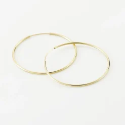 Histoire d'Or Créoles Muses Or Jaune